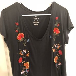 Dark soft shirt with floral pattern on front